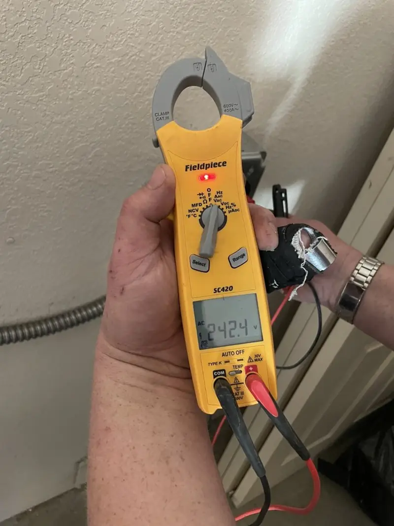 Voltage testing with clamp meter during Aluminum Wiring Replacement in Nibley